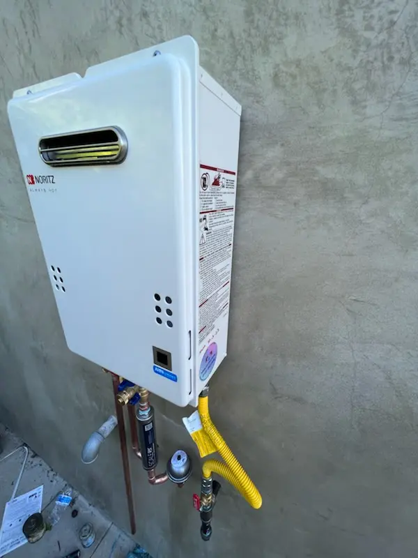 Tankless water heater installation for Gilpin Manor homes